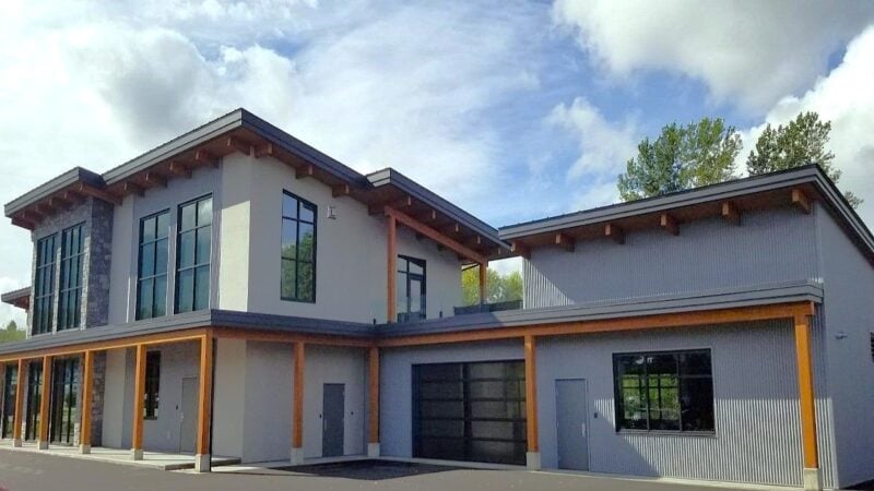 Contemporary office building with large windows and modern design features.