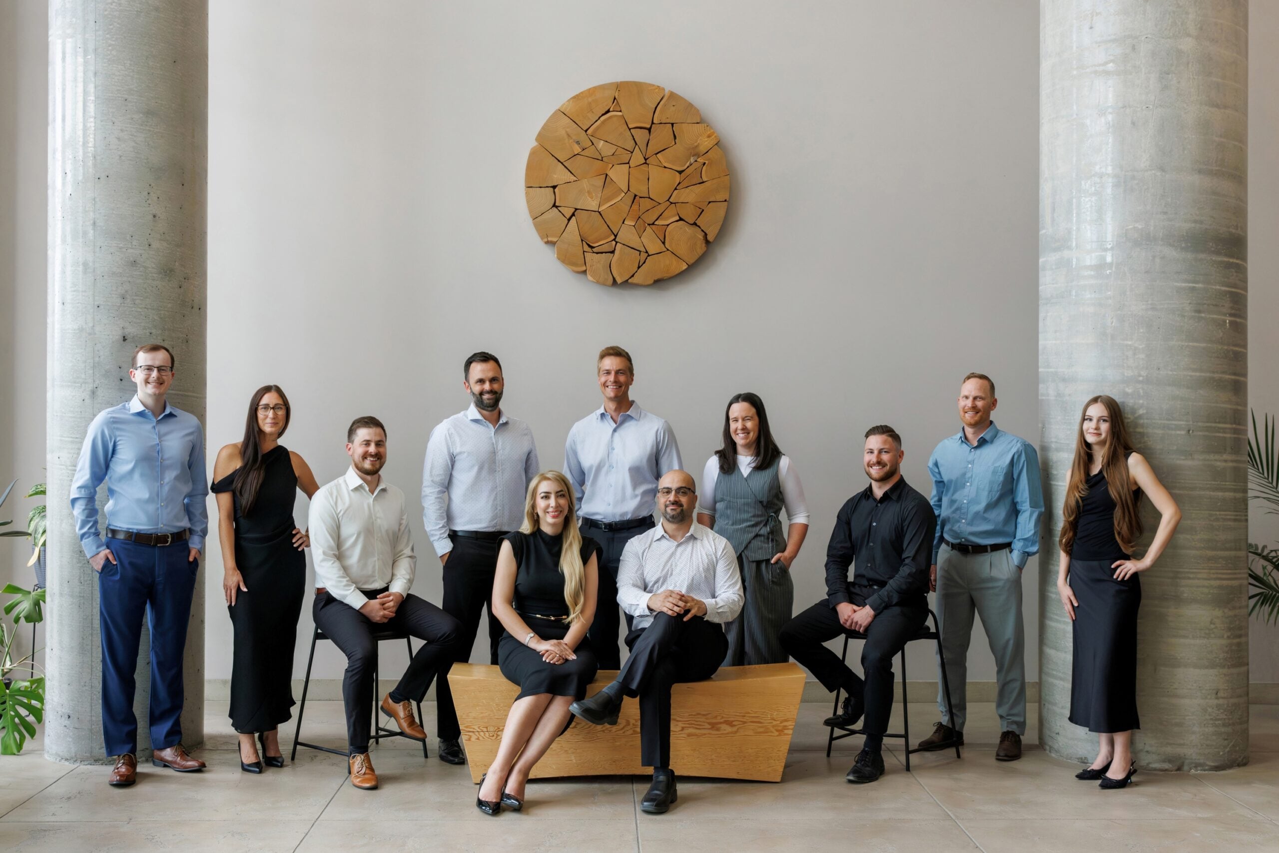 Group photo of ROV Engineering Consultants team in modern office.