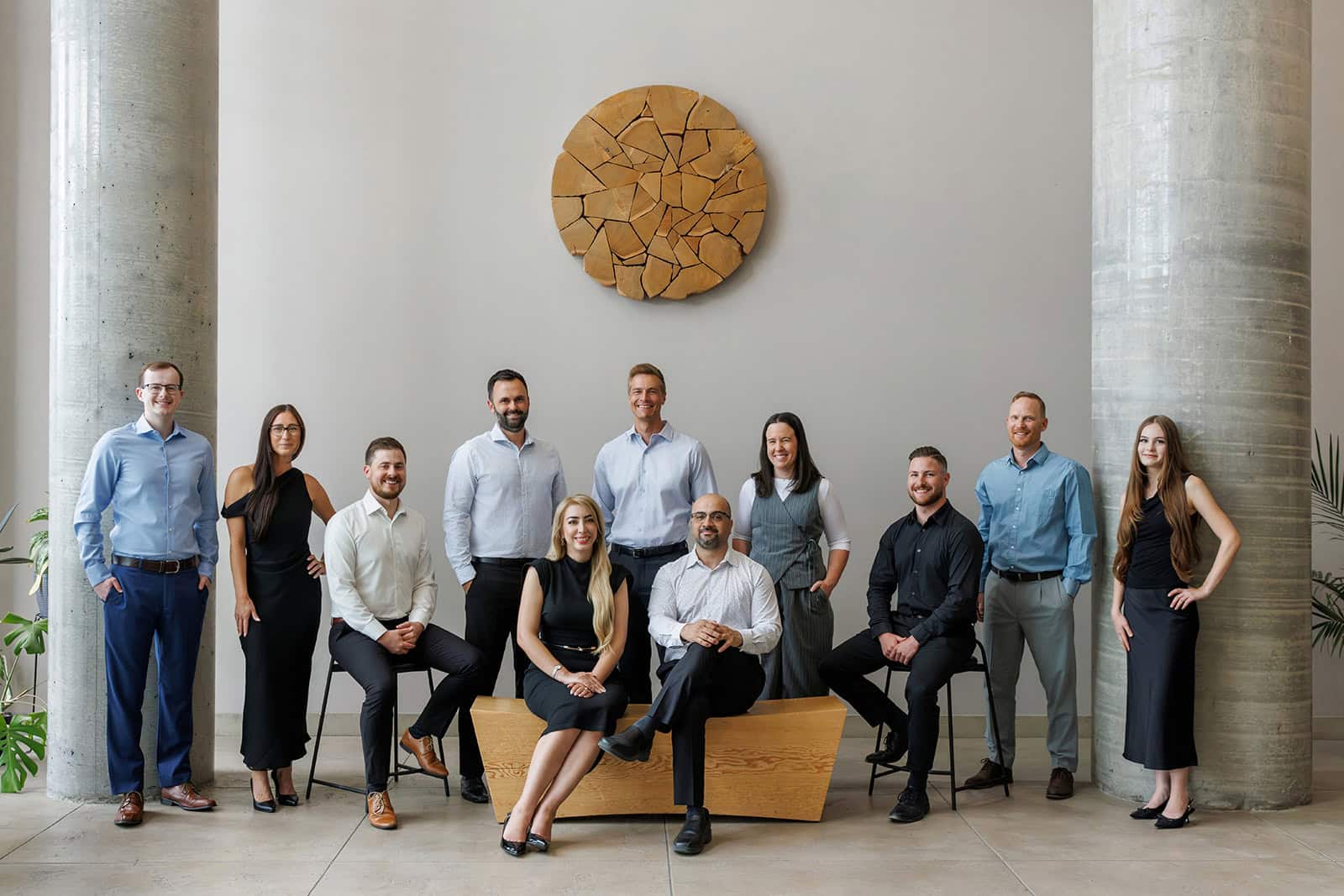 Group photo of ROV Engineering Consultants team in modern office.